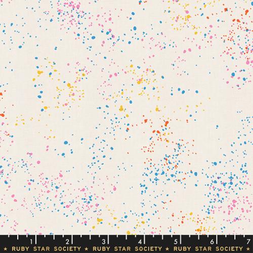 Ruby Star Society Speckled Confetti fabric by Rashida Coleman Hale for Moda Fabrics featuring colorful blue, pink, yellow, and orange paint splatters scattered across a soft cream premium quilting cotton background.