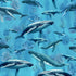 Humpback Whale cotton fabric by Timeless Treasures featuring whales swimming through blue ocean water with coral and underwater plants.