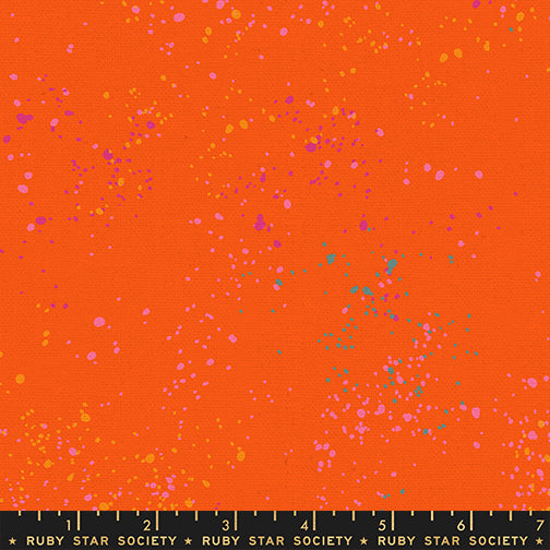 Ruby Star Society Speckled Splatter Paint Goldfish cotton linen canvas featuring turquoise, lavender, coral, and golden paint splatters on a vibrant goldfish orange background by Rashida Coleman-Hale for Moda Fabrics.