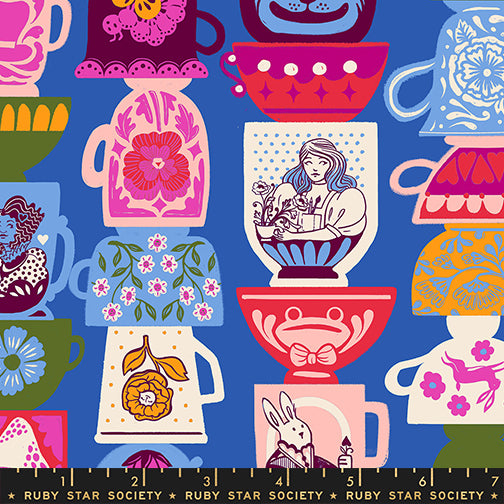 Hello Alice Teacup Blue Ribbon cotton fabric with stacked colorful teacups and Alice-inspired motifs.