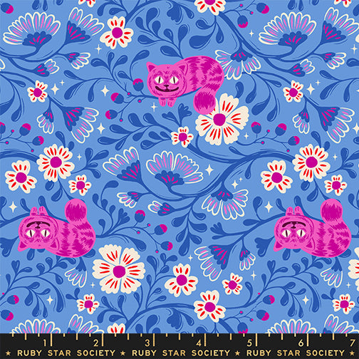 Hello Alice Cheshire Lindley Blue cotton fabric with pink Cheshire cats and floral vines on bright blue background.