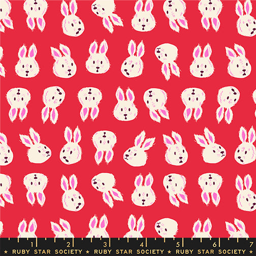 Hello Alice Rabbit Ruby cotton fabric with white rabbits on vibrant ruby red background.