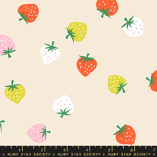 Strawberry Shell fabric by Kimberly Kight for Ruby Star Society and Moda Fabrics featuring tiny scattered coral, pink, white, and yellow strawberries on a soft shell premium cotton background.