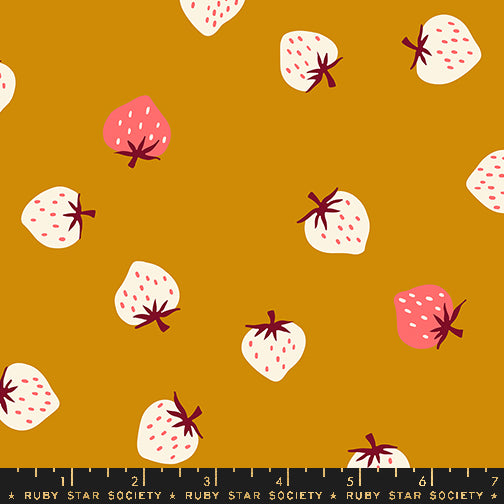 Strawberry Butterscotch fabric by Kimberly Kight for Ruby Star Society and Moda Fabrics featuring scattered cream and pink strawberries on a warm golden butterscotch premium cotton background.