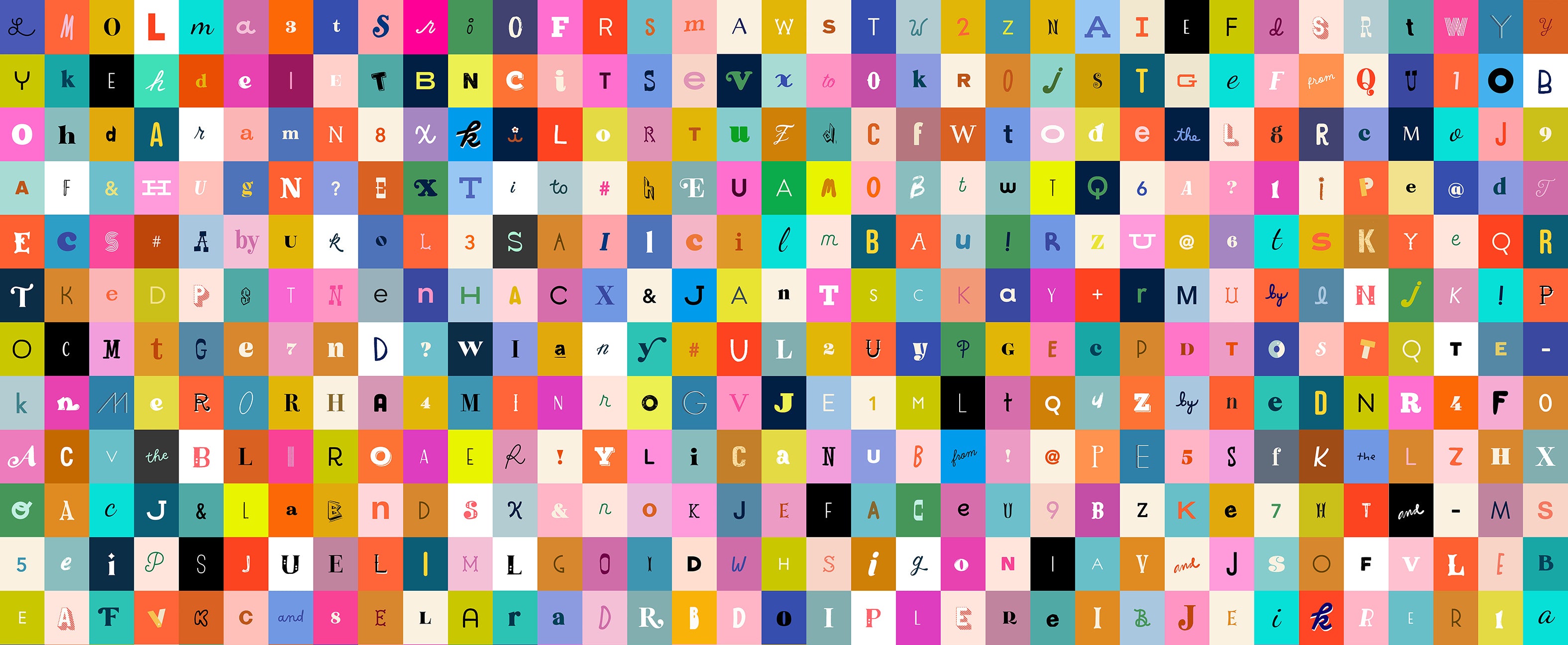 Colorful alphabet quilting cotton fabric featuring letters and symbols in rainbow patchwork blocks by Ruby Star Society for Moda Fabrics
