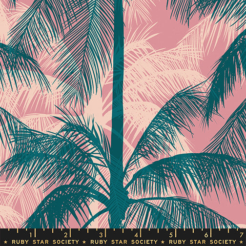 Poolside Too Plum premium cotton canvas featuring deep teal tropical palm trees on a blush pink background by Ruby Star Society for Moda Fabrics.