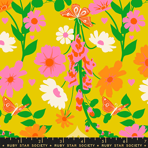 Close-up of Best Day Ever – Foxgloves Florals Butterflies Golden Hour Fabric by Melody Miller for Ruby Star Society, featuring pink, orange, and white flowers with butterflies on a golden-yellow background.