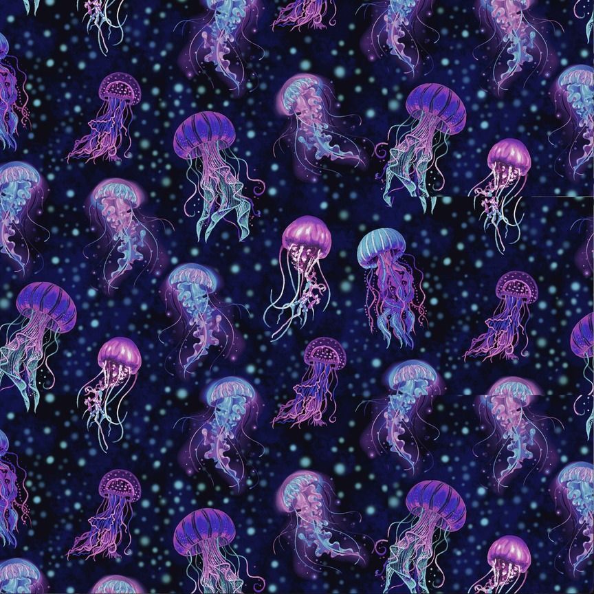 Bioluminescent Jellyfish cotton fabric by Timeless Treasures with purple, violet, aqua, and blue jellyfish on a midnight navy background.