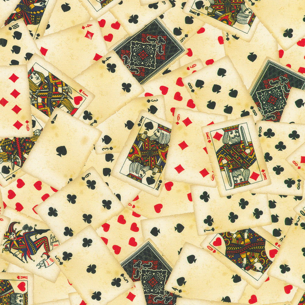 Vintage playing cards cotton fabric with hearts spades clubs and diamonds on cream background.