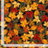 Fall Leaves Metallic Fabric by Timeless Treasures featuring autumn leaves with gold accents on black background