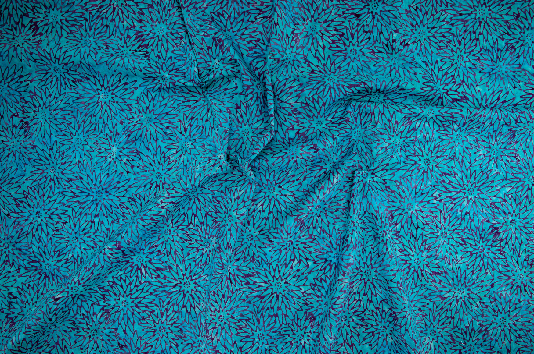 Malam Batiks Dhalia Turquoise fabric by Jinny Beyer for RJR, featuring hand-dyed batik floral design in rich turquoise on cotton