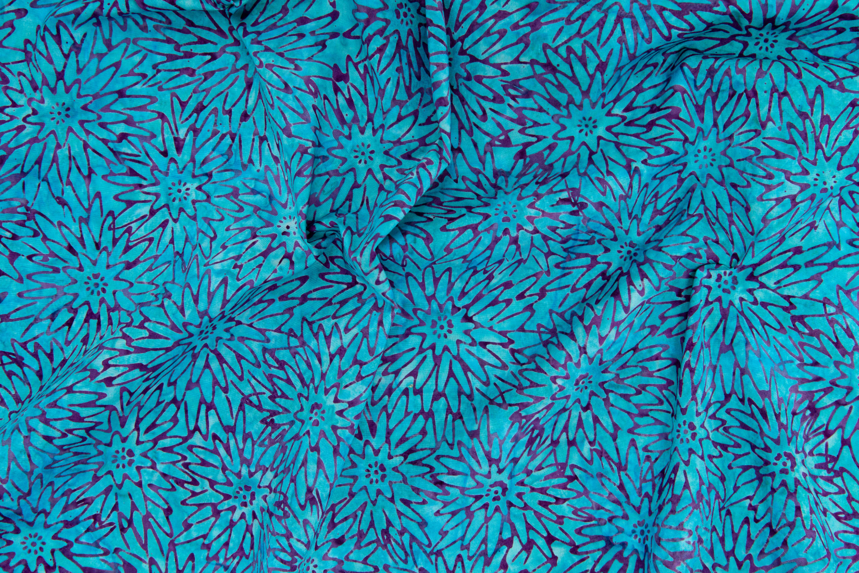Malam Batiks Dhalia Turquoise fabric by Jinny Beyer for RJR, featuring hand-dyed batik floral design in rich turquoise on cotton