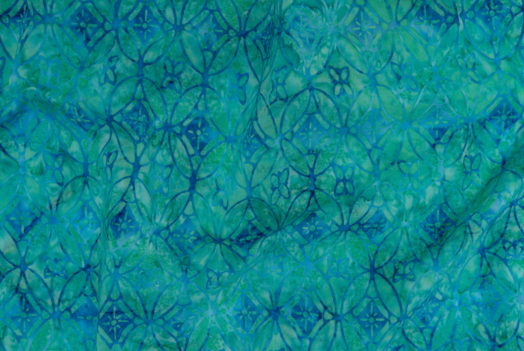 Malam Batiks X – Legacy – Ovals – Aquamarine batik fabric by Jinny Beyer for RJR Fabrics, featuring intricate oval patterns in soothing aquamarine hues.