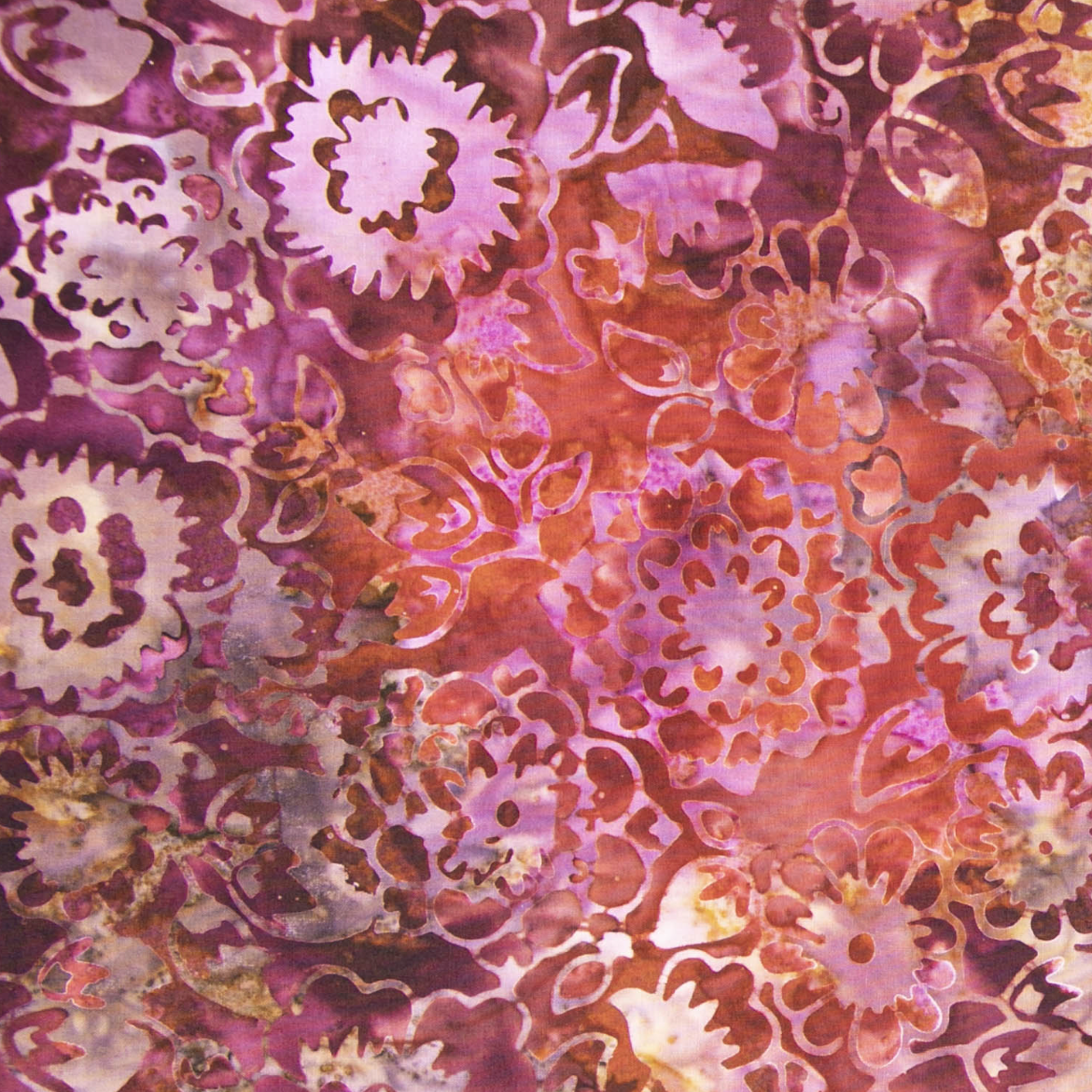 Malam Batiks VII Mums Burnt Orange Batik Fabric JB301-BU1B featuring intricate mum floral motifs in warm burnt orange hues.