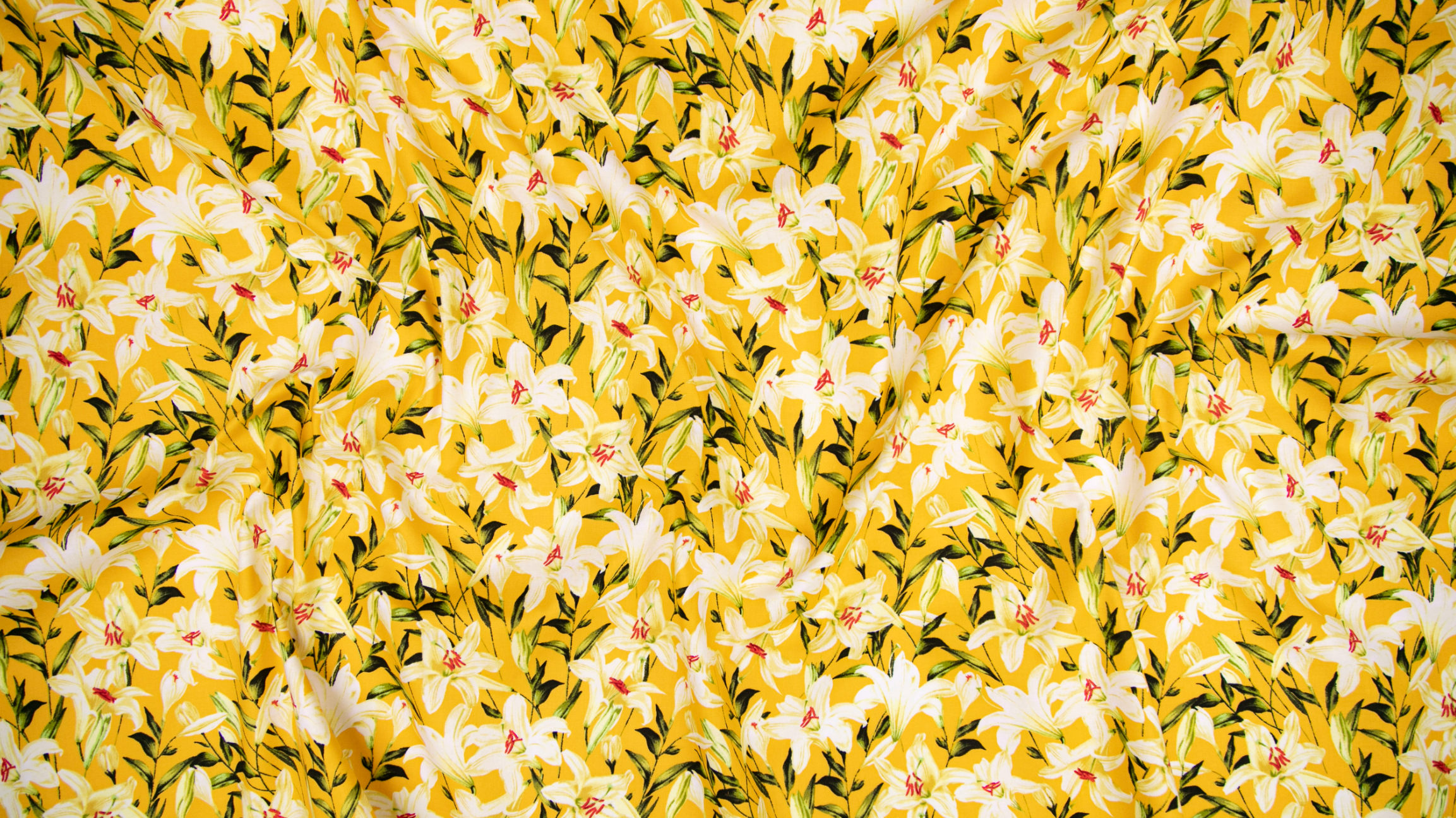 Citrus Garden - Lilies Gold fabric by RJR Fabrics (RJ1403-GO1) featuring golden yellow lily floral print on 100% cotton.