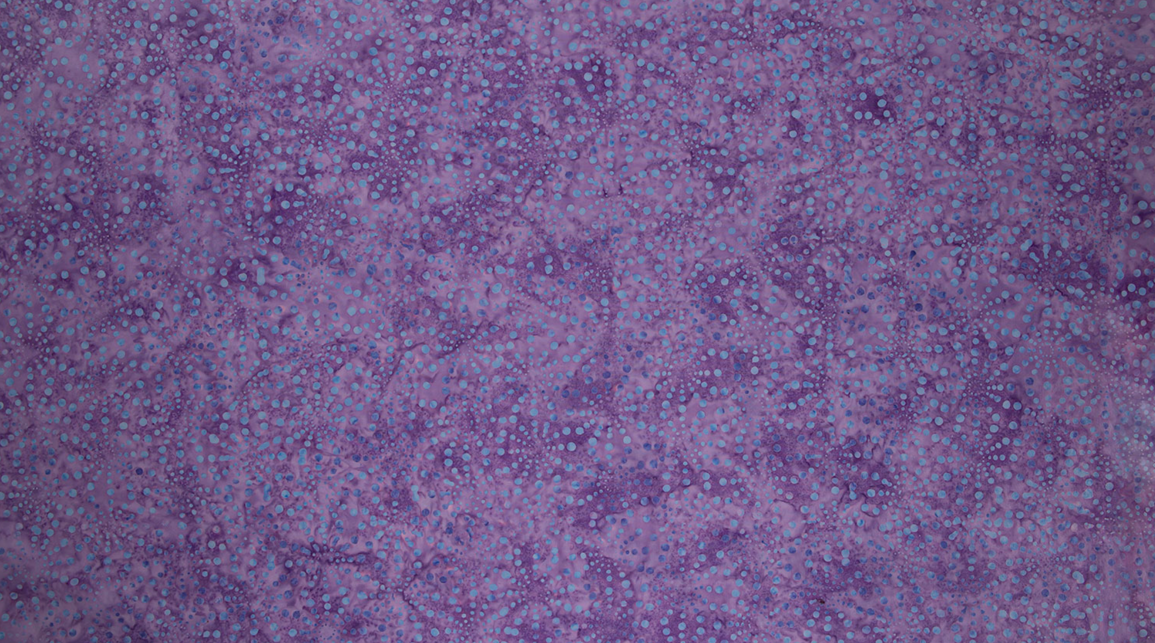 Bursts Lavender Batik Fabric by Jinny Beyer – hand-dyed batik quilting cotton in lavender from Malam Batiks VIII for RJR Fabrics.