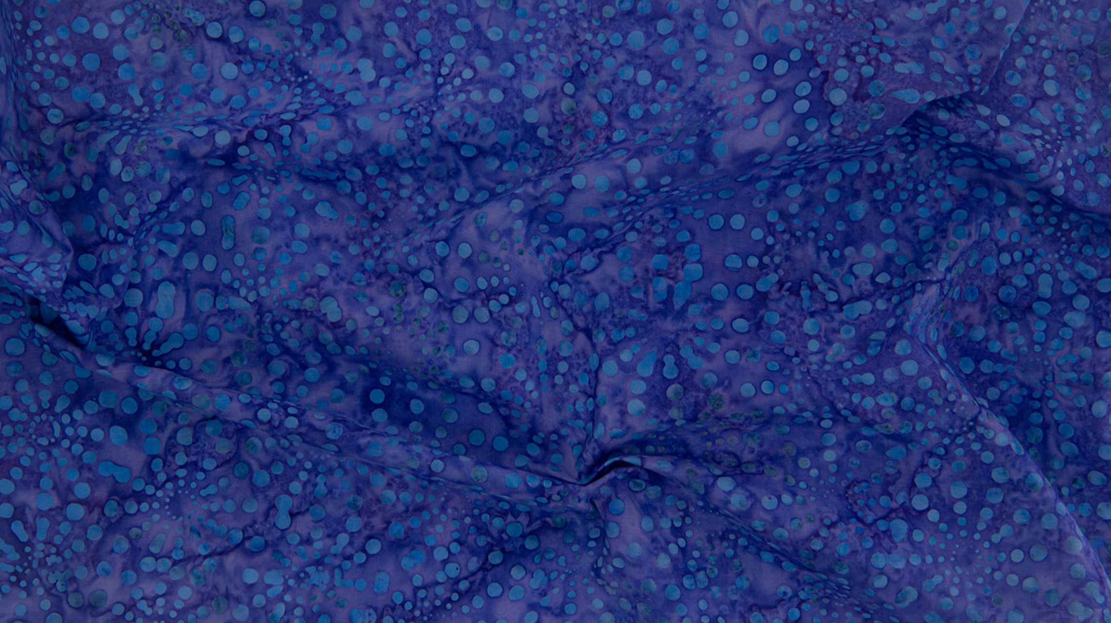 Bursts Navy Batik Fabric by Jinny Beyer – deep navy blue hand-dyed cotton batik from Malam Batiks VIII for RJR Fabrics.