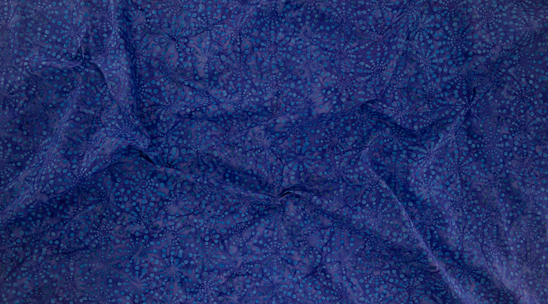 Bursts Navy Batik Fabric by Jinny Beyer – deep navy blue hand-dyed cotton batik from Malam Batiks VIII for RJR Fabrics.