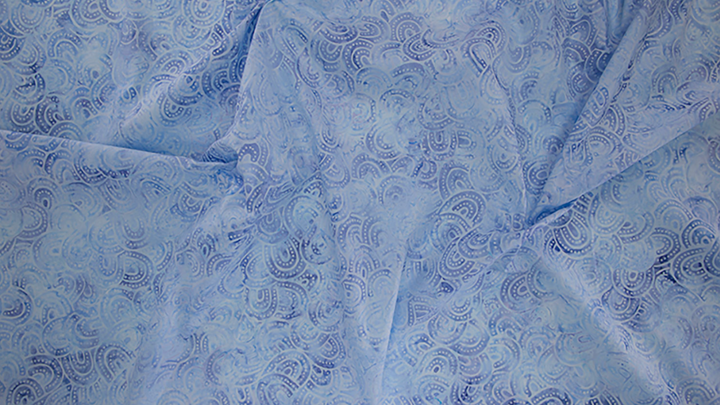 Ovals Lagoon Batik Fabric by Jinny Beyer – hand-dyed teal batik quilting cotton from Malam Batiks VIII for RJR Fabrics.