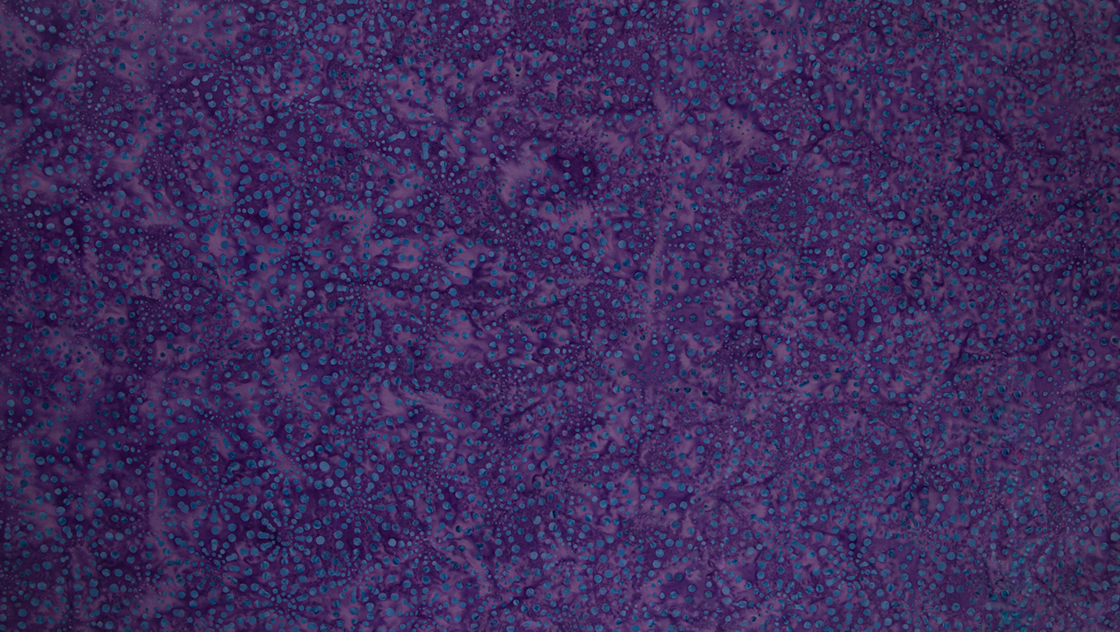 Bursts Purple Batik Fabric by Jinny Beyer – deep purple hand-dyed batik cotton from Malam Batiks VIII for RJR Fabrics.