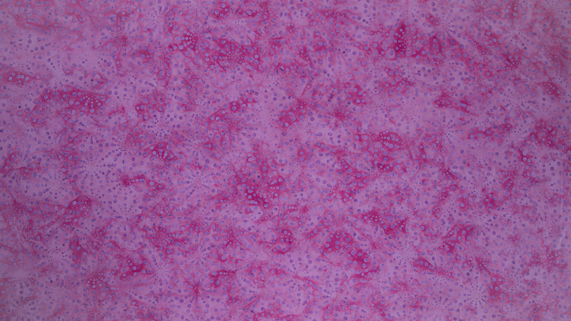 Bursts Rose Batik Fabric by Jinny Beyer – hand-dyed pink cotton batik with subtle bursts from Malam Batiks VIII by RJR Fabrics.