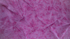 Bursts Rose Batik Fabric by Jinny Beyer – hand-dyed pink cotton batik with subtle bursts from Malam Batiks VIII by RJR Fabrics.