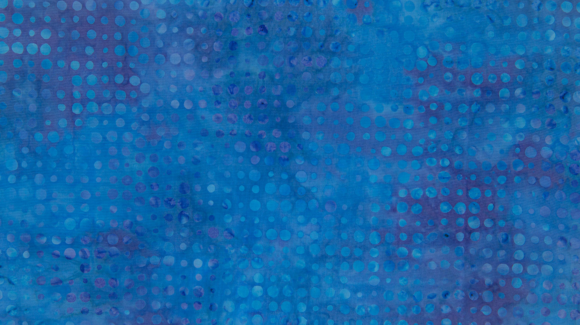 Dots Navy Batik Fabric by Jinny Beyer – dark blue hand-dyed cotton with scattered dot print from Malam Batiks VIII by RJR Fabrics.