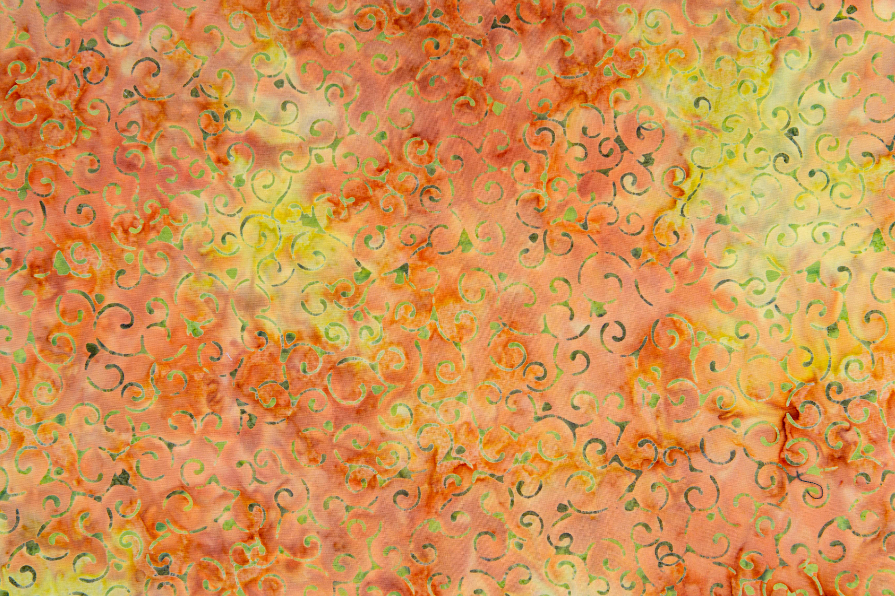 Scroll – Citrus batik fabric by Jinny Beyer - energetic scroll motif on bright citrus cotton.