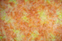 Scroll – Citrus batik fabric by Jinny Beyer - energetic scroll motif on bright citrus cotton.