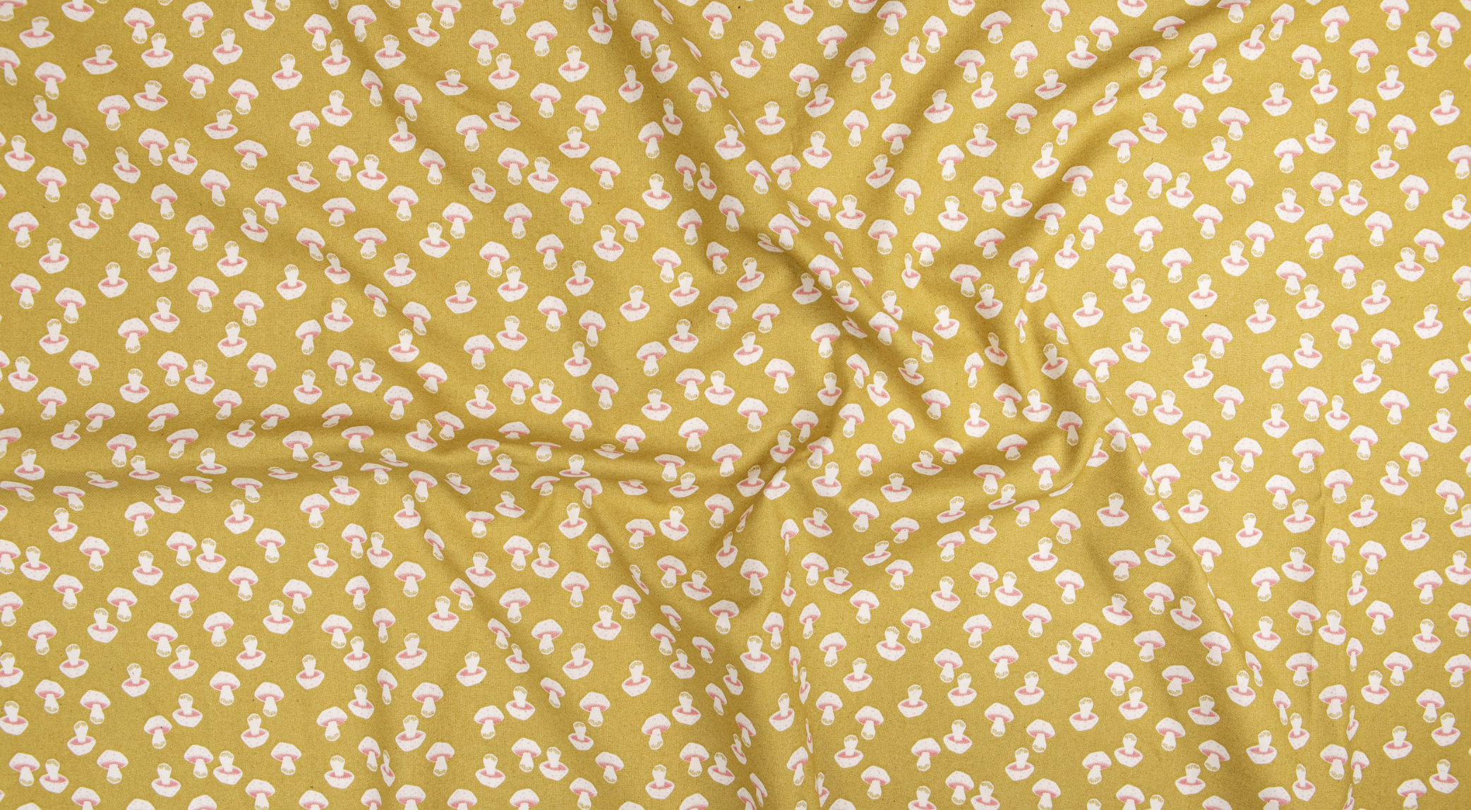 In The Woods – Mushroom Citrine Unbleached fabric by Loes van Oosten: small yellow mushroom print on natural cotton.