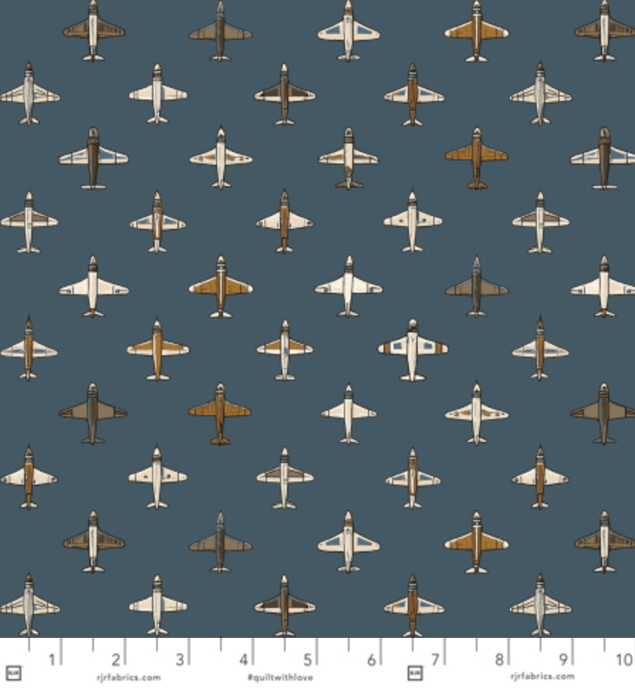 Blue aviation fabric with airplanes – Aviator Flying Together by RJR Studio for RJR Fabrics.