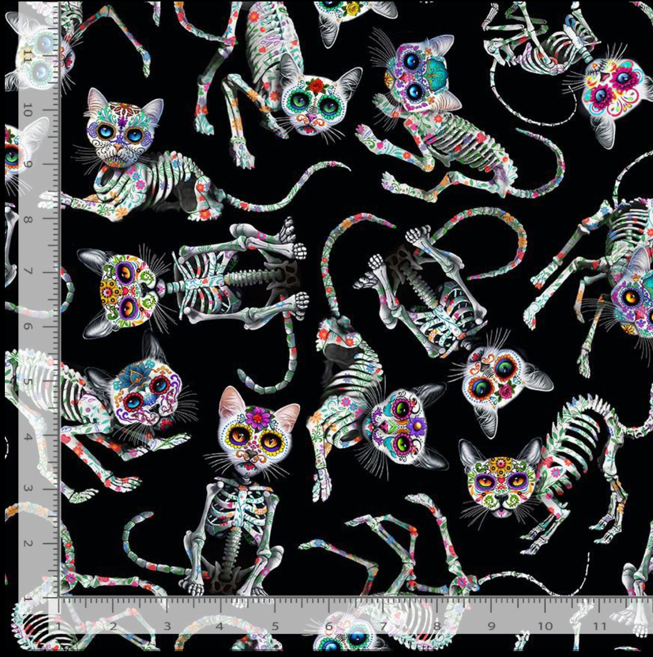 Day of the Dead - Tossed Skeleton Cats Fabric by Timeless Treasures featuring playful sugar-skull style skeleton cats on a black background.