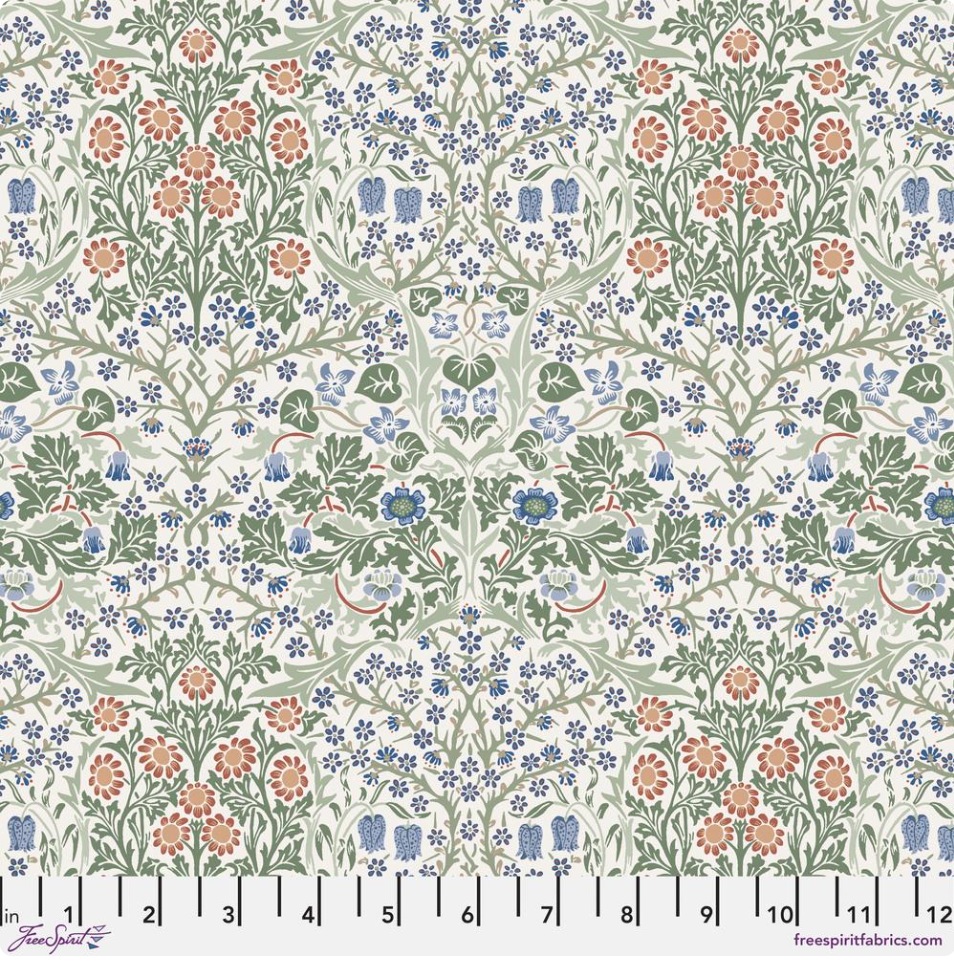 Blackthorn Multi Bexleyheath cotton lawn fabric by The Original Morris & Co. featuring floral and leafy motifs in green, blue, and terracotta tones by Free Spirit Fabrics.
