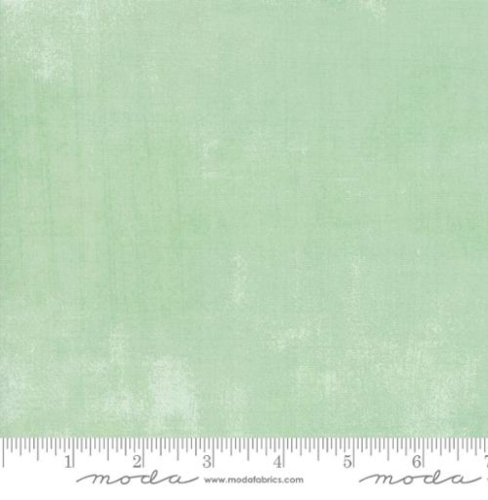 Grunge Basics Seacrest fabric by BasicGrey for Moda Fabrics featuring a textured mint green brushed design.