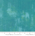 Close-up of Grunge Basics Mint Tea Fabric by BasicGrey for Moda Fabrics featuring textured mint green cotton print.