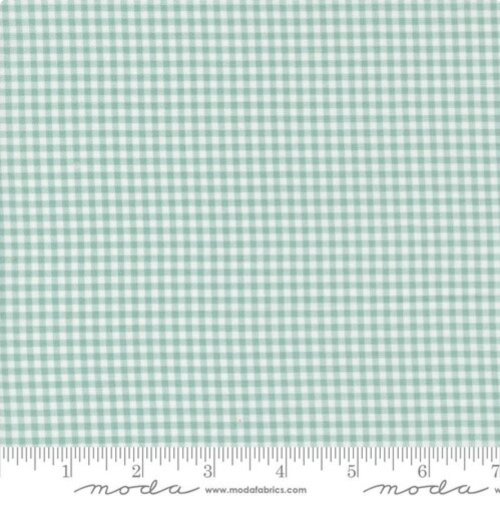 Shine Gingham Sky Fabric by Sweetwater for Moda Fabrics – soft blue and white gingham 100% cotton fabric shown with fine weave texture.