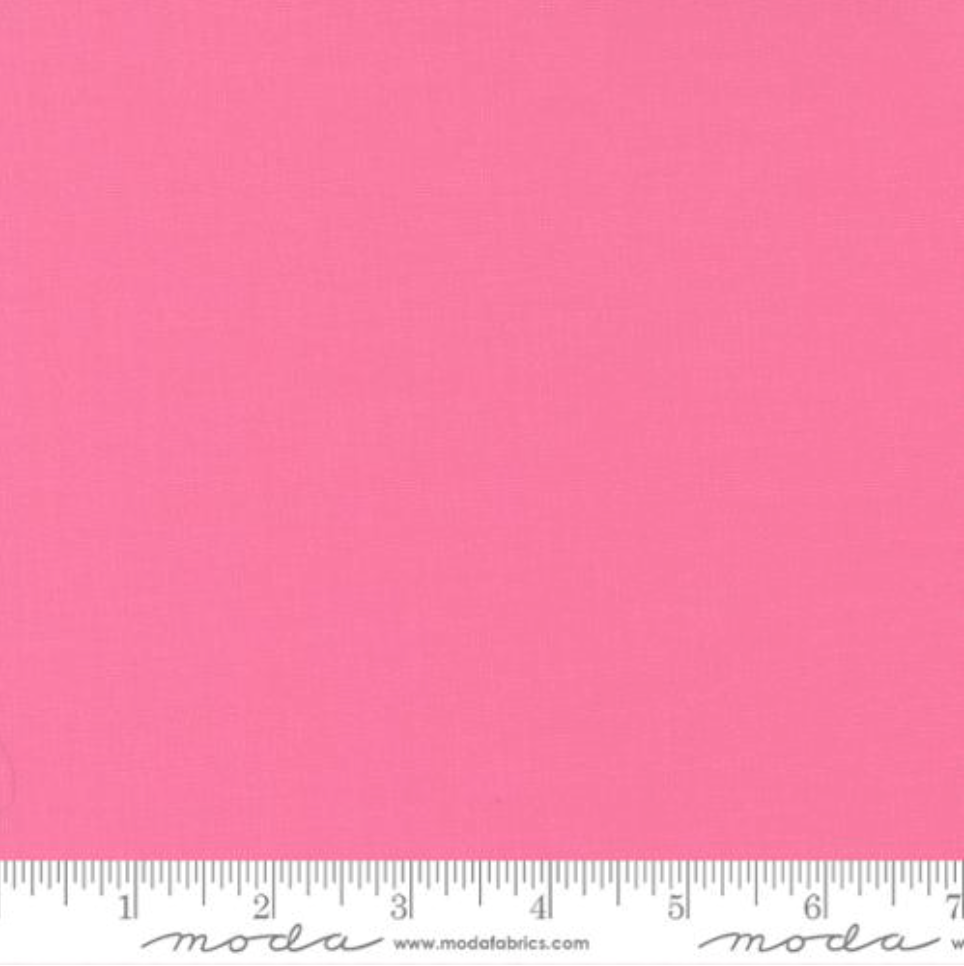 Bella Solids 30’s Pink Fabric by Moda Fabrics – soft vintage pink 100% cotton quilting fabric with smooth matte texture.