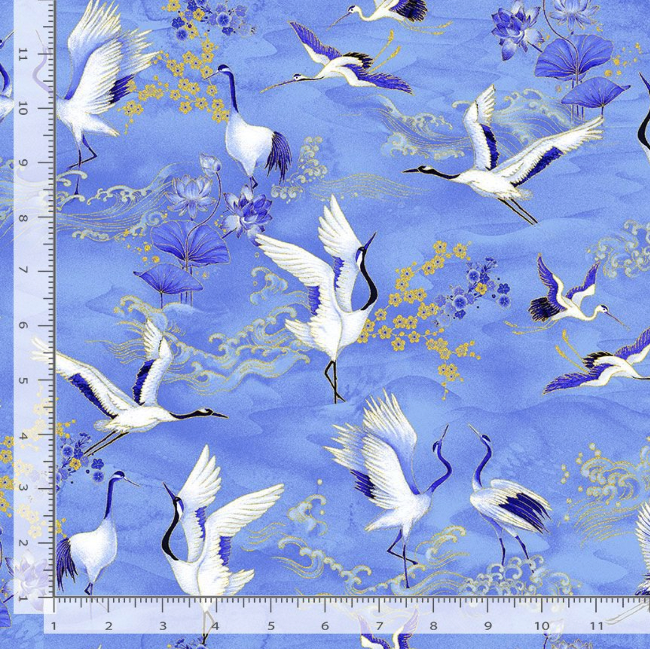 Blue metallic crane fabric with white cranes, blue florals, and gold accents by Chong-a Hwang for Timeless Treasures.