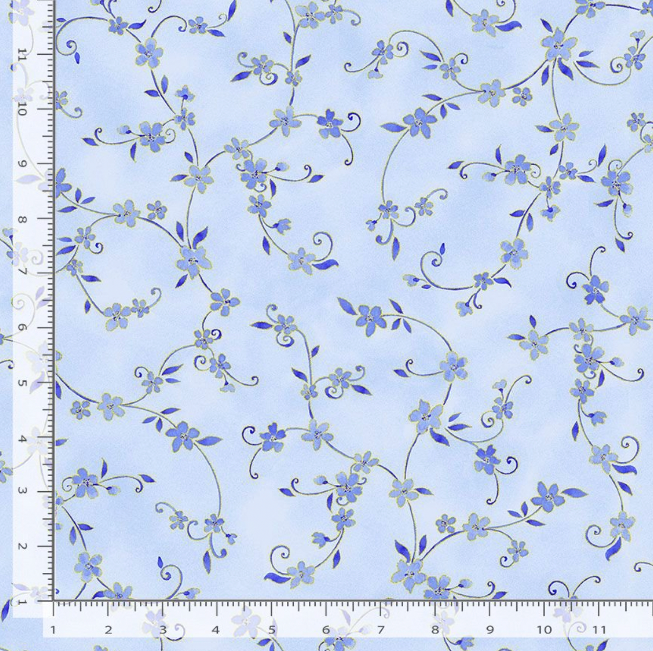 Sky blue floral vine fabric with gold metallic accents by Chong-a Hwang for Timeless Treasures.