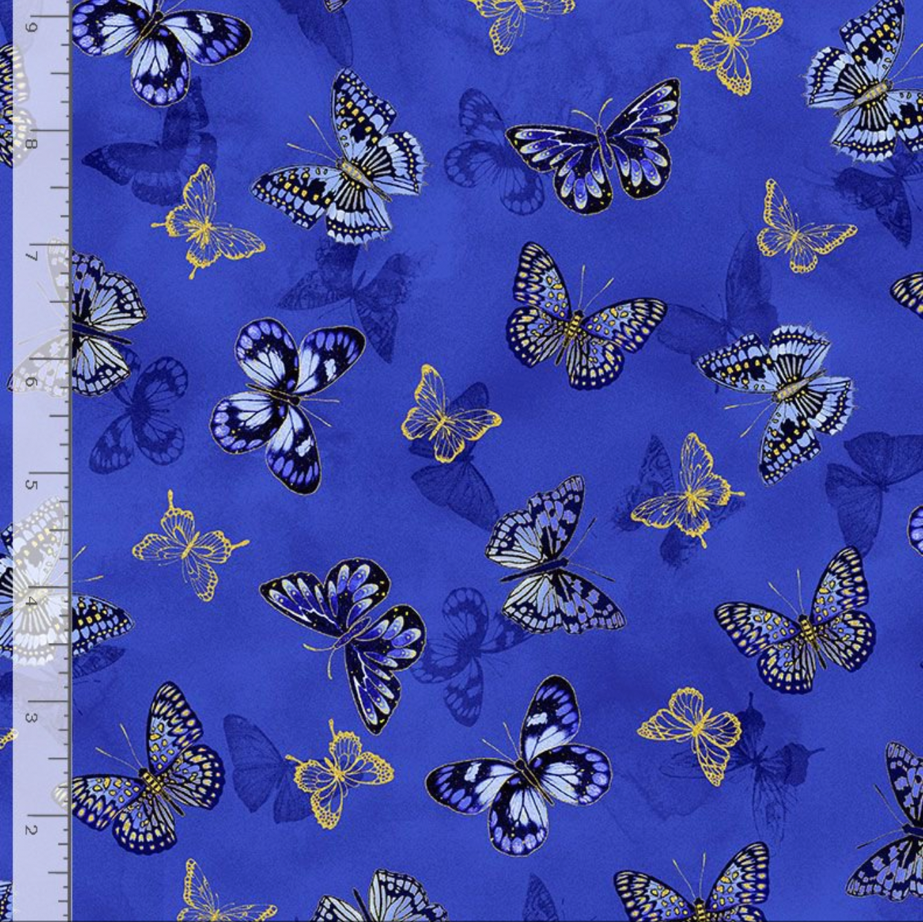 Metallic tossed butterfly fabric in royal blue with gold accents from the Moonlight collection.