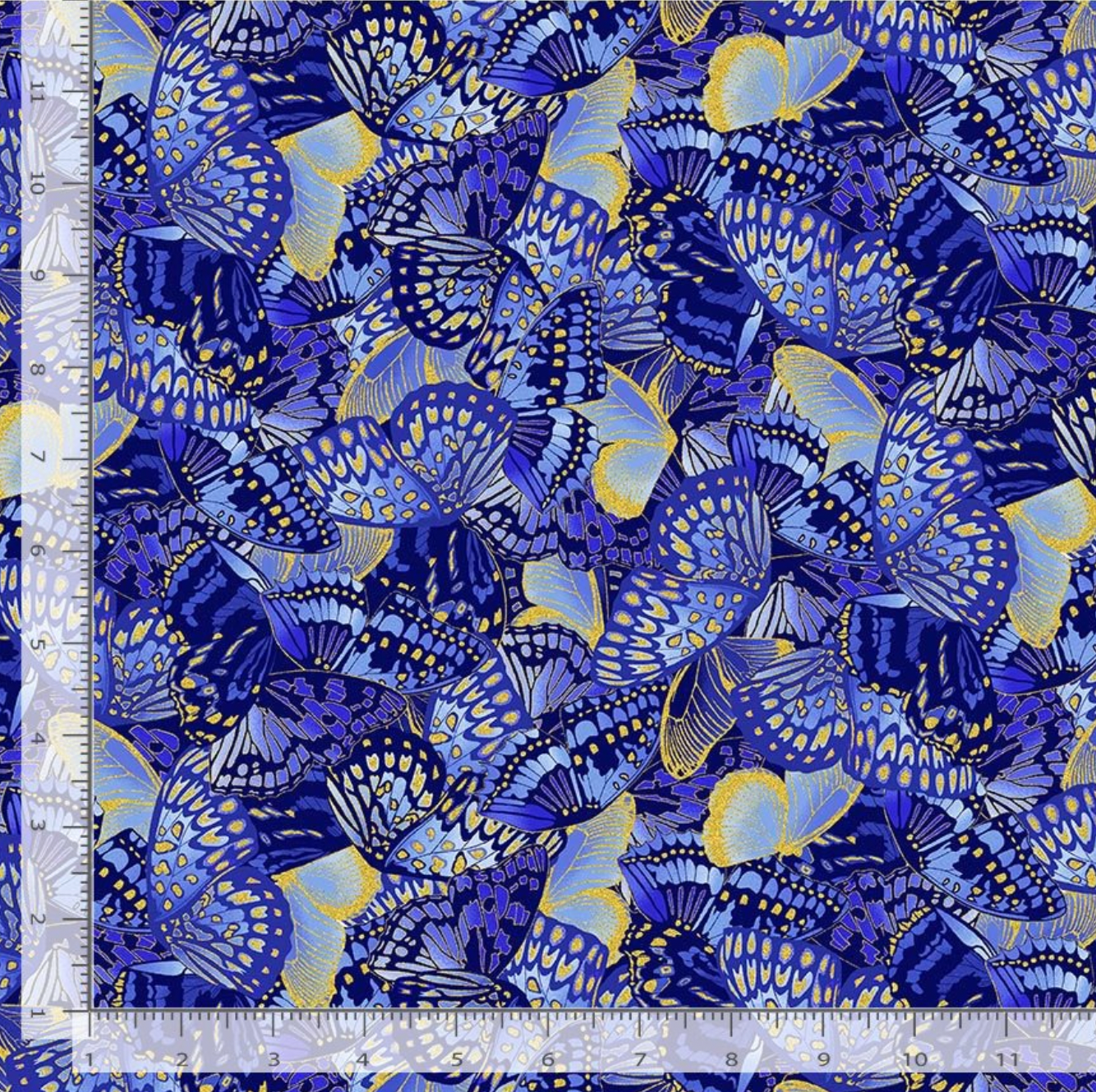 Packed indigo and blue butterflies with gold metallic accents on cotton