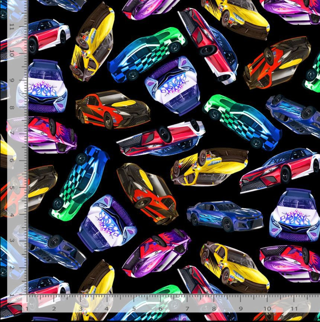 Thrill Seeker race cars fabric with colorful sports cars tossed on a black background by Michael Searle for Timeless Treasures.