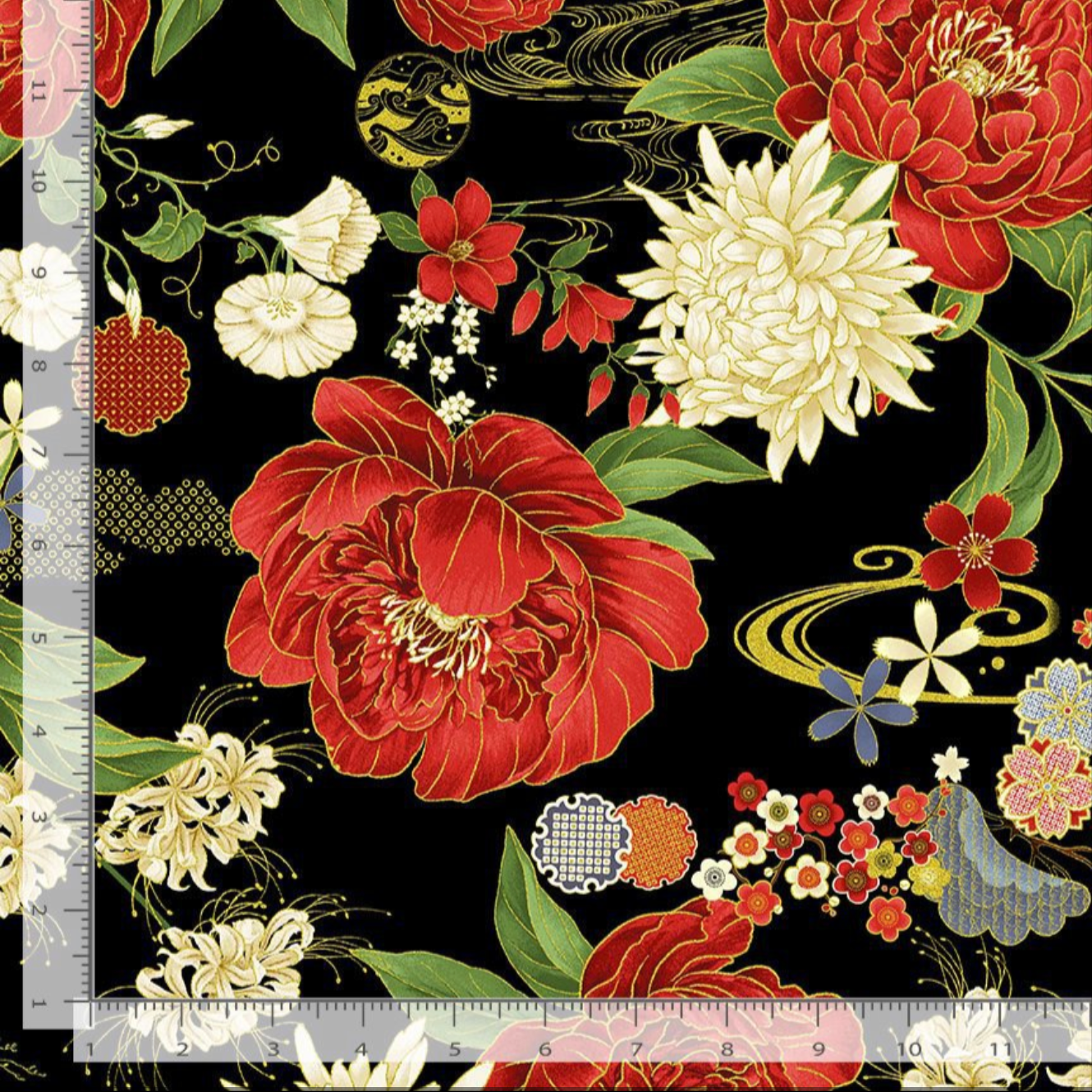 Metallic lotus floral fabric on black background with red ivory flowers and gold details