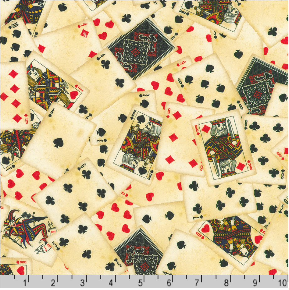 Vintage playing cards cotton fabric with hearts spades clubs and diamonds on cream background.