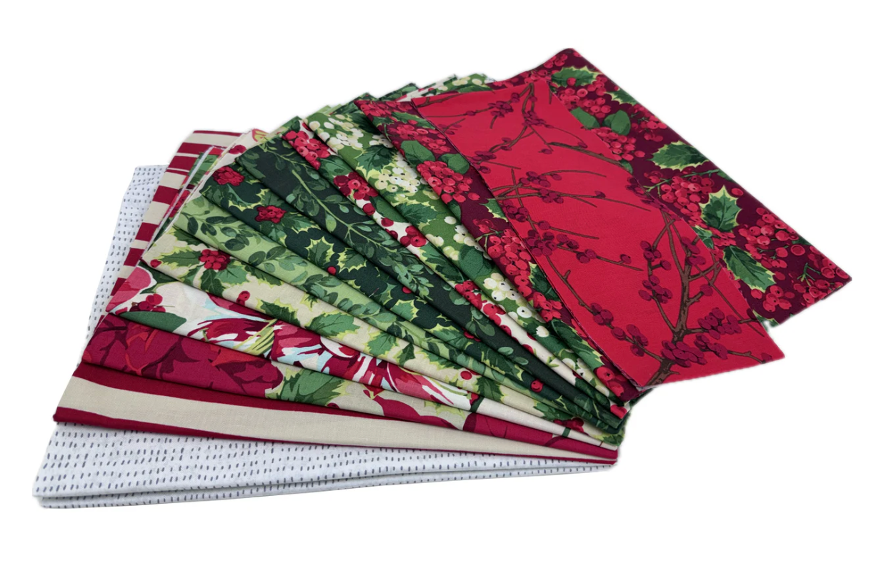 Winterberry Quilt Kit by Martha Negley for Free Spirit Fabrics featuring festive holiday quilt fabrics in red and winter floral prints