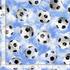 Soccer balls breaking through nets on blue sky background digital print fabric by Timeless Treasures