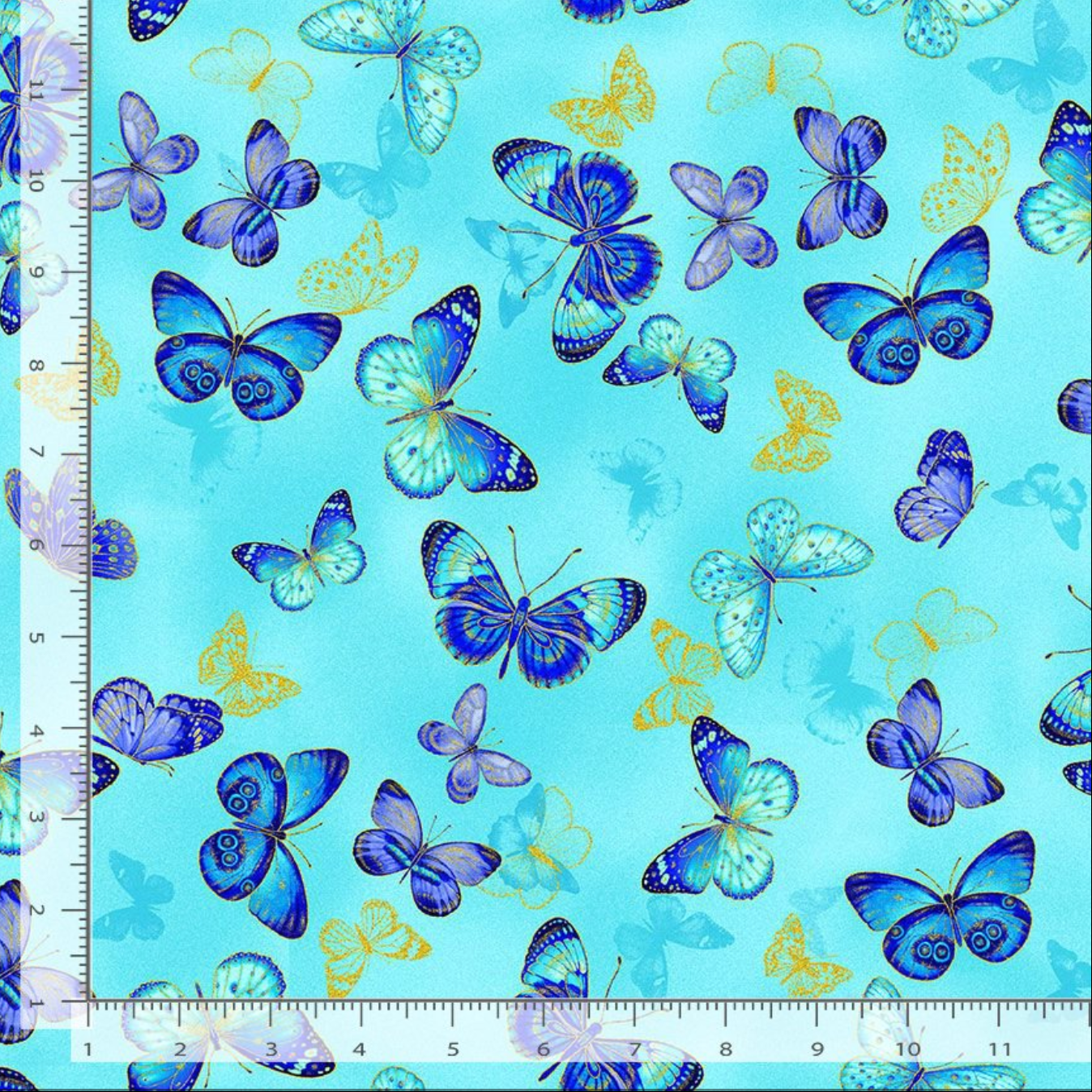 Blue metallic butterflies with gold accents floating across a soft aqua cotton background from the Escapade Collection by Timeless Treasures.