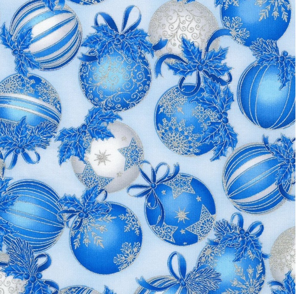 Blue Christmas ornament fabric with silver metallic accents and holly details by Robert Kaufman.