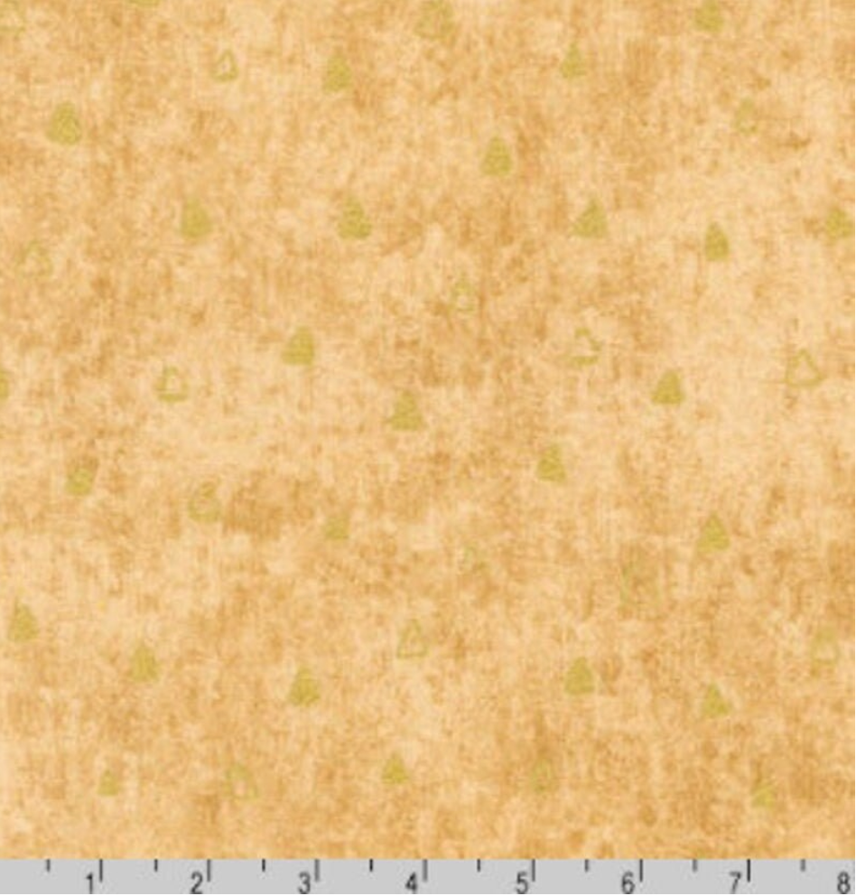 Gold metallic quilting fabric featuring subtle triangle motifs on a textured gold background by Robert Kaufman Studio RK.