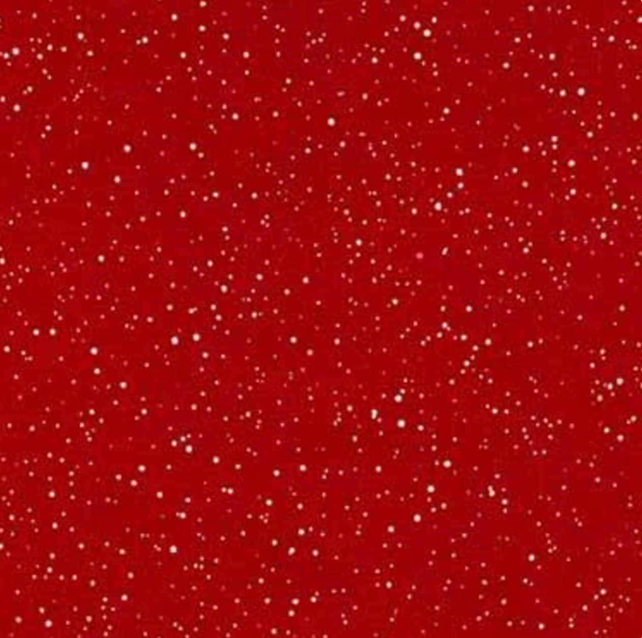Bright red cotton fabric featuring scattered metallic sparkle accents resembling falling snow from Winter's Grandeur 7 by Liza Bea Studio for Robert Kaufman Fabrics, ideal for Christmas quilting and holiday sewing projects.